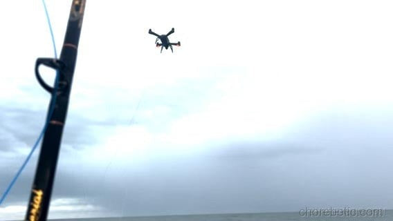 Xpece ONE fishing drone flying over water with camera and propellers, designed for fishing and aerial photography.