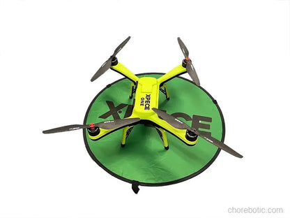 Xpece Landing foldable drone landing pad with orange and black design, portable and durable for drone takeoffs and landings.